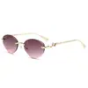 Nuevas Gafas de Sol Sin Marco de Borde Cortado para Mujer Estilo Retro Ins de Moda Montura de Metal Gafas Transfronterizas Europeas y Americanas Gafas de Sol con Cabeza de Leopardo para Mujer