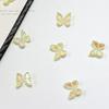 Joyería de uñas pequeña mariposa 2023 nueva galvanizada M Mariposa Chica europea y americana joyería de uñas de resina al por mayor