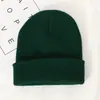 Placa de luz cor sólida Chapéu de lã acrílica Amazon para homens e mulheres casal Europeu e Americano outono e inverno Chapéu pullover de tricô preto e branco