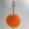 Venta Directa de Fábrica Colgante de Bola de Pelo de Conejo Sintético Accesorios para Mascotas Materiales para Juguetes Colgante para Bolso Llavero Bola Redonda
