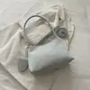Bolso tipo baguette de lunares estilo suave para mujer, versátil, diseño de bolsa colgante para madre e hijo, bolso de axila, nicho, fresco, de un solo hombro, cruzado, bolso para mujer