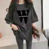 Camiseta de manga corta para mujer talla grande de seda de leche, longitud media-larga, holgada, transpirable, estampado de verano, top versátil, transfronterizo