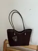 Bolso grande de mano vintage transfronterizo para mujer, nuevo modelo otoño 2026, bolso de hombro simple, bolso tote de moda casual para el día a día