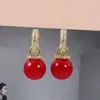 Venta caliente transfronteriza pendientes de diseño nicho Corea del Sur moda exquisita lujo ligero alta calidad llenos de pendientes de perlas
