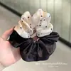 Selección PremiumElásticos elegantes y con estilo, nueva colección de accesorios para el cabello de nicho de alta gama para recoger el cabello en la parte posterior de la cabeza