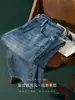 Jeans casuales vintage estilo americano en color azul para hombre, textura ligera de negocios, adecuados para ir al trabajo, de pierna recta, ligeramente anchos, amigables con la piel, con una bonita caída.