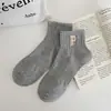 Meias Meias Curtas Femininas Ins Trendy All-match Primavera e Outono Cano Baixo Raso Exterior Wear Cyber Celebridade Letra C Bordada Meias Curtas Meias Brancas
