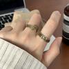 Anillo de bronce tejido con diseño de flor de hierba Tang de alta calidad para mujer, anillo abierto de lujo, ligero, personalizado, elegante y combinable con todo, estilo retro.