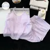 Pijama de camisola de encaje de color liso estilo coreano para mujer, nuevo modelo de verano 2026 con copas en el pecho, conjunto dulce y simple de ropa de casa fina