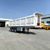 Semirremolque de Volteo Trasero de Tres Ejes Cuatro Ejes Sitio Minero Patio de Materiales Viga Principal de Acero de Alta Resistencia Semirremolque de Volteo Trasero Hidráulico