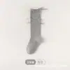 Novedades de Primavera y Otoño Calcetines hasta la Pantorrilla para Niñas Estilo Coreano Color Sólido Algodón Peinado Calcetines Sueltos Calcetines de Pantorrilla Estilo Ballet Lazo