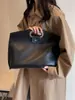 Bolsa de grande capacidade feminina outono versátil 2023 nova clutch simples casual portátil para o dia a dia e trabalho bolsa tote