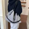 Bolso de lona a rayas estilo coreano inspirado en Ins para mujer, nuevo modelo 2026, bolso de hombro tipo tote casual versátil de gran capacidad para el trabajo