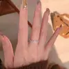 Anillo de Flor de Cinco Pétalos Hueco de Encaje Fresco de Diseño de Nicho Estilo Coreano y Japonés para Mujeres, Anillo de Moda Dulce Simple