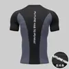 Ropa de Fitness al por Mayor para Hombre, Running, Entrenamiento de Maratón, Atletismo, Deportes de Verano, Secado Rápido, Transpirable, Camisetas Deportivas de Manga Corta