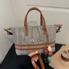 Moda de Verano 2026 Transfronteriza Versátil Exquisito Diseño de Nicho Pequeño Cuadrado para Viajar de Alta Gama Bolso Cruzado de un Solo Hombro