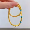 Nuevo estilo chino turquesa pez pequeño pulsera plegable cobre chapado en oro pulsera de cuerda elástica diseño joyería literaria para hombres y mujeres