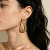 Nuevos pendientes minimalistas geométricos en forma de U dorados brillantes de estilo transfronterizo europeo y americano, diseño versátil de nicho para mujer