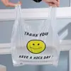 Atacado spot sacola de compras super portátil com rosto sorridente sacola plástica sacola tipo colete sacola para levar embalagem de supermercado