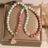 Nuevo Pulsera de Doble Círculo de Piedra Shoushan Estilo Chino para Mujer, Lujo Ligero, Nicho, Exquisita, Sensación de Alta Gama, Joyería de Pulsera de Piedra con Patrón Rojo de Semillas de Loto