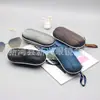 Caja de gafas con cremallera de EVA, gancho portátil, caja con cremallera negra, caja para gafas de tela Oxford, caja para gafas de sol nueva al por mayor