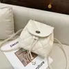 Moda Otoño 2025 Cadena Color Sólido Versión Coreana Nicho Estilo Chanel Mochila de Diamantes Mochila Pequeña Simple para Mujer