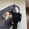 Bolsa de palha feminina da moda 2026 novo modelo, bolsa de ombro e transversal estilosa e elegante, bolsa de balde texturizada para carregar na mão