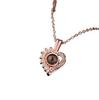 Collar de proyección de corazón bañado en cobre con "Te amo" en 100 idiomas, de gran venta transfronteriza, con una cadena de clavícula fresca, dulce y sencilla.