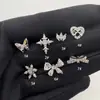 Brincos de Aço Titânio 316L com Microincrustação de Zircônia, Estilo Doce e Elegante, Apresentando Designs de Laço, Floco de Neve e Cruz com um Toque de Design de Alto Padrão