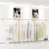 Estante de exhibición para tienda de ropa estante de hierro dorado para ropa de mujer ropa de niños colgante lateral de pared colgador de exhibición de pared