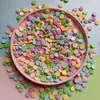 Accesorios de resina de flores de tamaño pequeño Joyería para uñas de flores pequeñas Mini Accesorios hechos a mano con pegamento de crema Horquilla