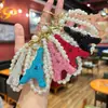 Nuevo Llavero de Torre Eiffel con Brillo de Pedrería de Lujo Cadena de Perlas Hecha a Mano Exquisito Adorno Pequeño Colgante para Bolsos de Mujer