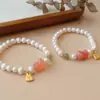 Pulsera elegante de doble círculo de jade y cristal de perla de marea nacional, pulsera de personalidad de nicho, pulsera de moda de alta sensación, venta al por mayor para mujeres