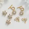 Colgantes de Flor Hueca Chapados en Oro Cobre Accesorios para Joyería DIY Accesorios para Pulseras de Cuentas Collares Materiales Venta al por Mayor