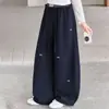 Calça pantalona xadrez patchwork para meninas, novo estilo outono, calça de moletom infantil folgada com bordado de laço, calça casual para crianças maiores