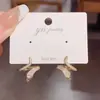 Pendientes de serpiente con microincrustaciones de circonita, diseño de moda de nicho, con personalidad única, aguja de plata S925, exquisita y versátil joyería para las orejas.