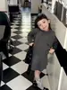Conjunto de Punto para Niñas 2026 Otoño Nuevo Estilo Coreano Conjunto Cardigan de Punto para Bebé Suéter de Manga Corta y Falda