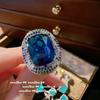 Anel de safira de papagaio Sotheby's floresta tropical banhado a ouro 18K anel de pássaro com zircônia azul do mar profundo