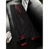 Nuevos pantalones casuales de color block texturizados más vendidos para hombre, nuevo diseño de moda de alta costura, versátiles, fluidos, pantalones largos de corte holgado