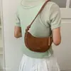 Bolsa transversal de ombro único diagonal sob o braço moda jovem versátil 2026 feminina simples coreana novo estilo bolsa de mão de veludo pele de veado outono