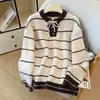 Nuevo suéter de punto a rayas de otoño europeo y americano para mujer, estilo casual versátil holgado, diseño de cuello redondo, top de manga larga