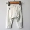 Pantalones de bebé de venta caliente para primavera y otoño, pantalones largos de algodón, pantalones para pañal, leggings de grado A para niños, pantalones envolventes para bebé