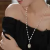Nuevo collar de perlas artificiales de doble capa, cadena para la clavícula de moda exquisita transfronteriza, cadena de suéter de lujo ligero estilo francés