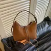 Bolso Hobo de Ante Retro para Mujer 2026 Nuevo Pequeño de Nicho Versátil Moda Otoñal Versátil Pequeño de Nicho Bolso de Hombro Cruzado