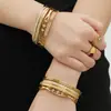 Pulsera Combinada de Acero Inoxidable con Hebilla de Diamante de Zirconia de una Sola Fila Moda Europea y Americana Joyería de Mano Genial Chapada en Oro de 18K Sin Decoloración