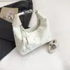 Bolsa de Mão Estilosa e Simples Estilo Coreano 2026 Verão Nova Nicho Ins Ombro Transversal Bolsa Lua Crescente para Mulheres