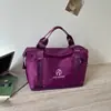 Colección de otoño 2026 transfronteriza: bolsa de viaje corta para mujer, bolsa de mano portátil, bolso de hombro, bolsa casual para la playa o piscina, bolsa para deportes y fitness