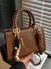 Bolso Pequeño de Diseño de Nicho para Mujer Estampado de Leopardo 2025 Nuevo Moda Japonesa y Coreana Bolso de Hombro Tejido de Mano Cruzado Bolso Cuadrado Pequeño