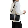 Artículo popular de comercio exterior: bolsa cilíndrica con tiras de piel suave, correa ancha para el hombro, bolso de mujer con tacto de calidad, adecuado para el uso diario, se puede llevar al hombro o cruzado