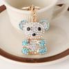 Llavero de metal con colgante de oso y bolsa de diamantes creativo, accesorio para coche, bonito regalo pequeño al por mayor